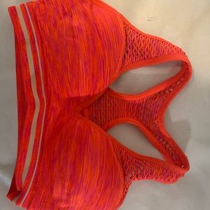 PINK bright orange sports bra